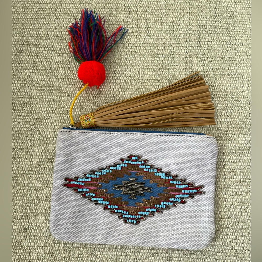 NWOT Sam Edelman Aztec Beaded Design Clutch Bag With Pompom and Zipper Closure.